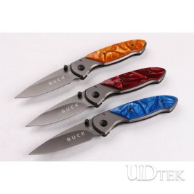 BuckX55 folding knife with three different camo colors in stock UD404419